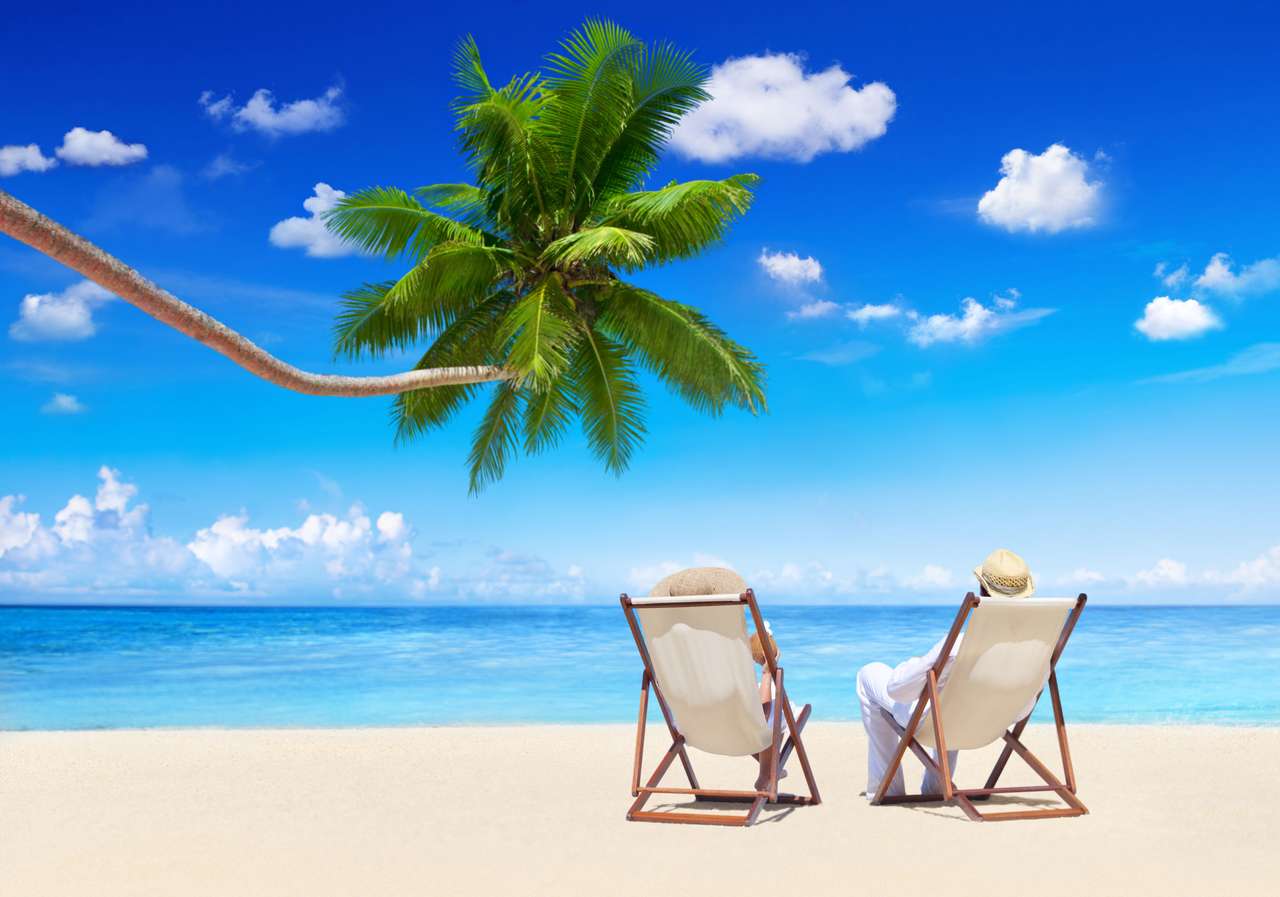Para relaksuje na plaży puzzle online