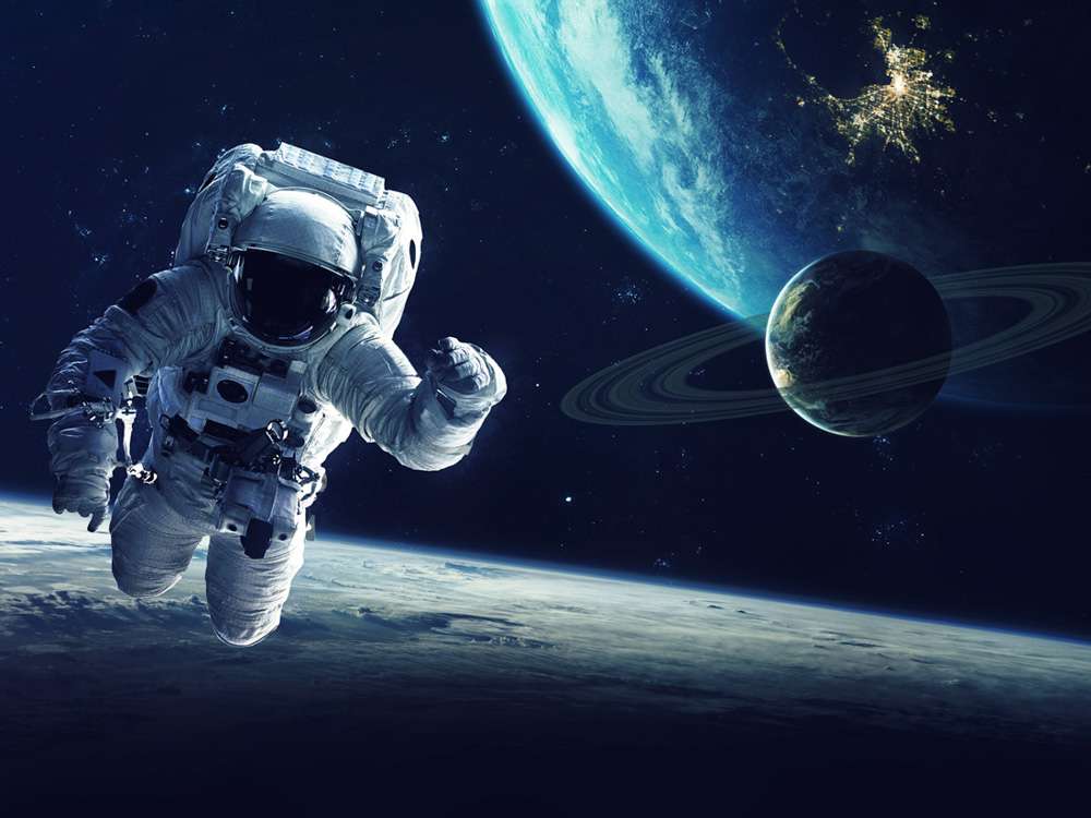 człowiek w kosmosie puzzle online ze zdjęcia