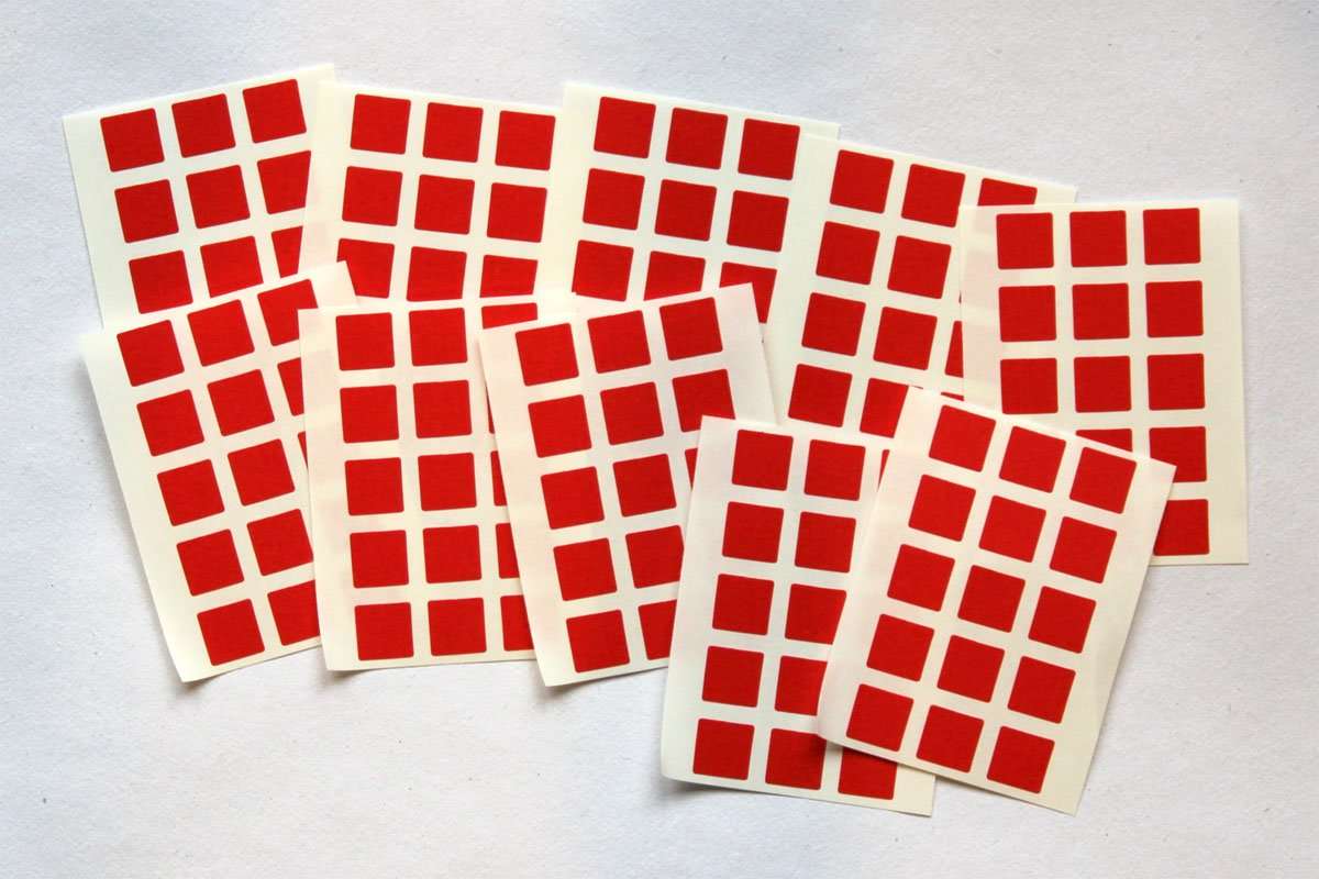 Czerwone kwadraty na papierze. puzzle online ze zdjęcia